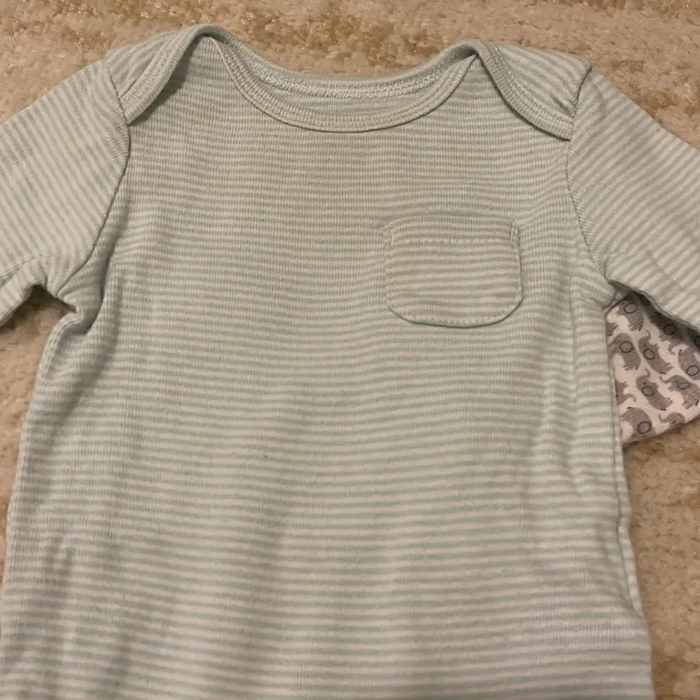 Bundle of five 0-3 month long sleeve shirt onesies